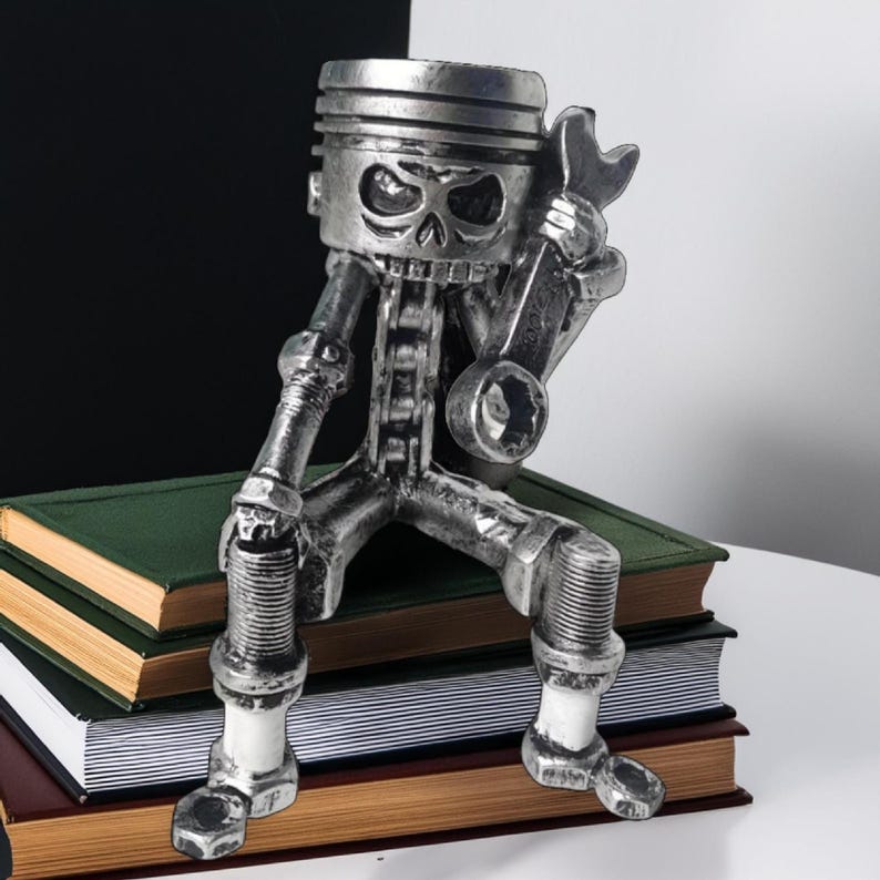Piston Skull Resin Sculpture with Wrench Legs: Industrial Tabletop Decor for Car Enthusiasts