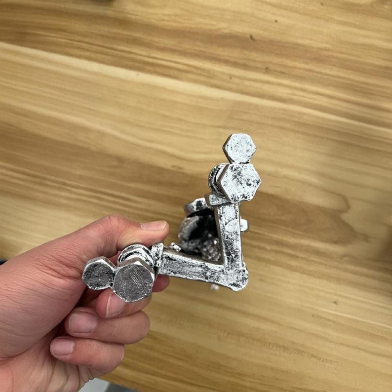 Piston Skull Resin Sculpture with Wrench Legs: Industrial Tabletop Decor for Car Enthusiasts