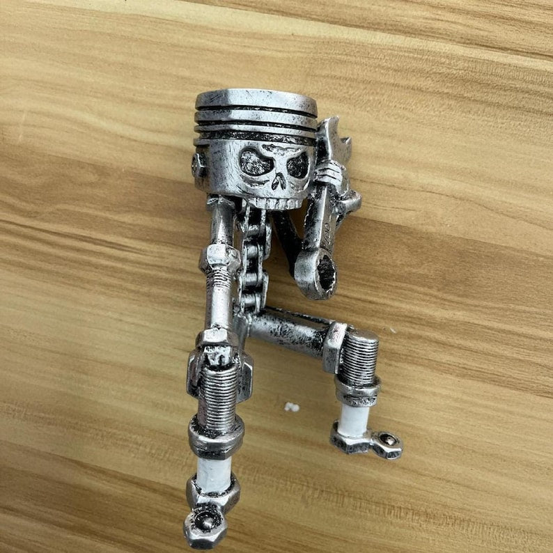 Piston Skull Resin Sculpture with Wrench Legs: Industrial Tabletop Decor for Car Enthusiasts