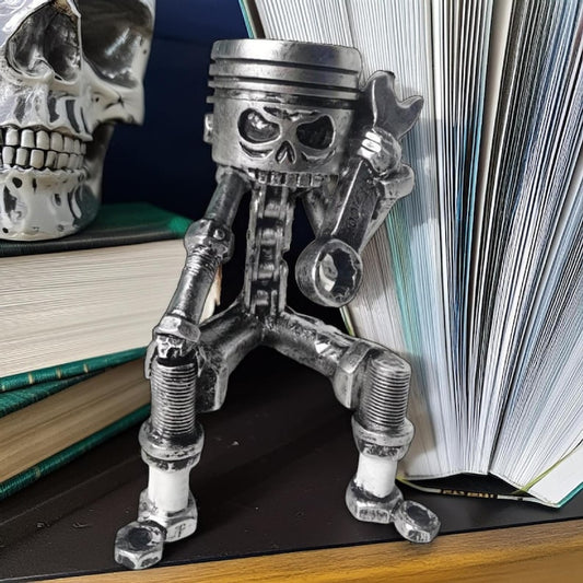 Piston Skull Resin Sculpture with Wrench Legs: Industrial Tabletop Decor for Car Enthusiasts